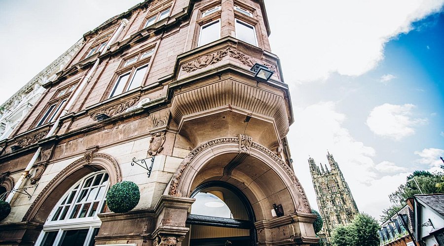 The Bank Bar and Bistro exterior with St Giles' Church