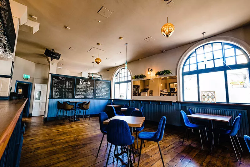 The Bank interior - seating area with arched windows
